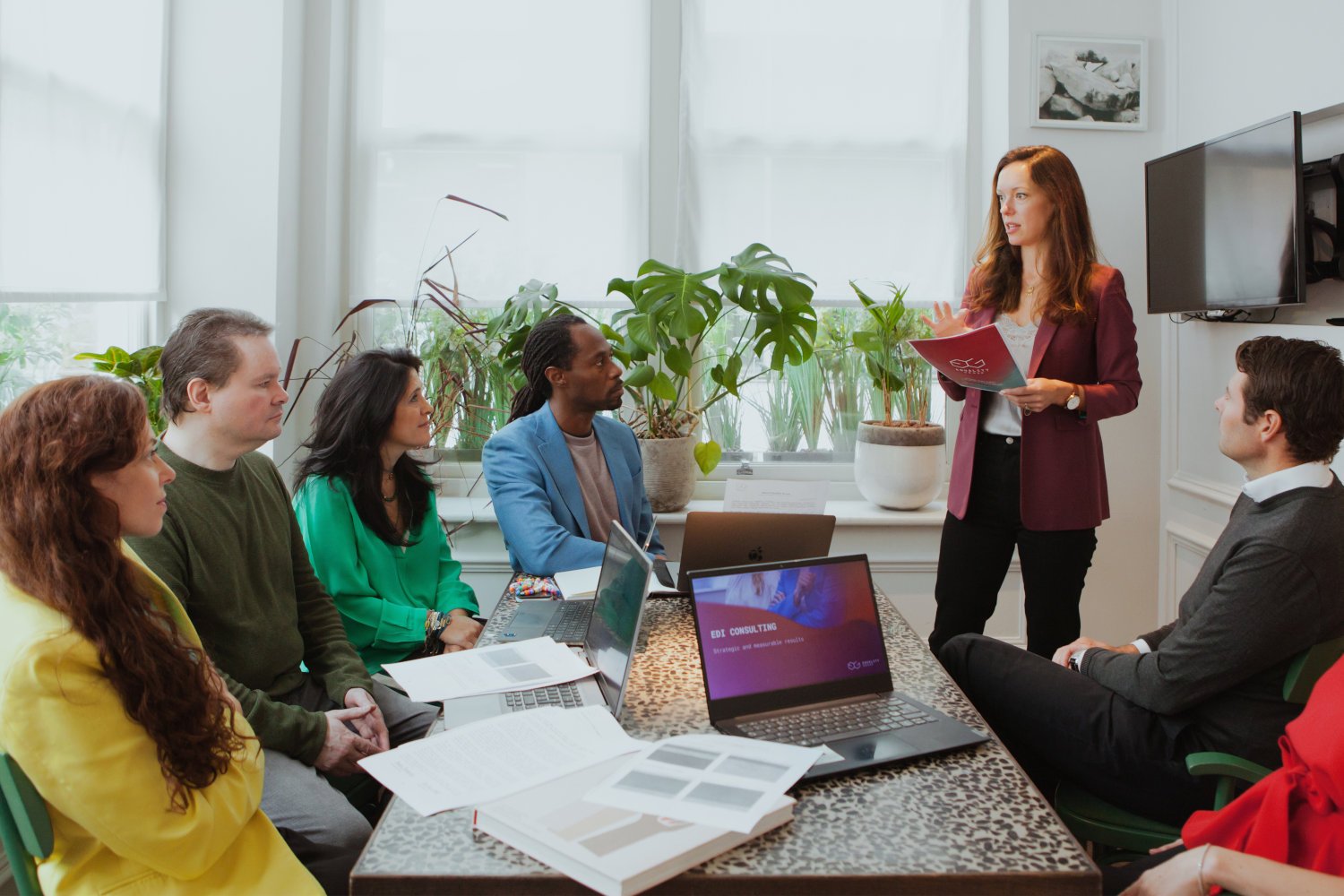 equality-group-colleagues-meeting-presentation